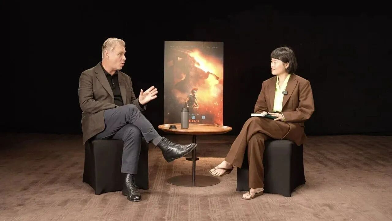 A Chinese philosophy podcaster out-interviewed every film journalist — and Christopher Nolan loved it